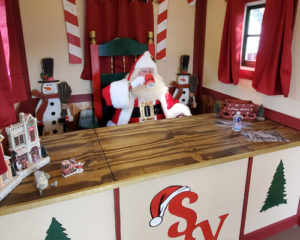 santa drinking hot cocoa